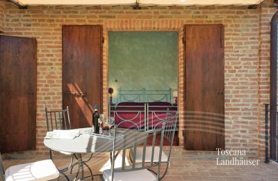 Casa di campagna in vendita Asciano, Toscana, RIF 2992 Terrasse mit Blick in SZ